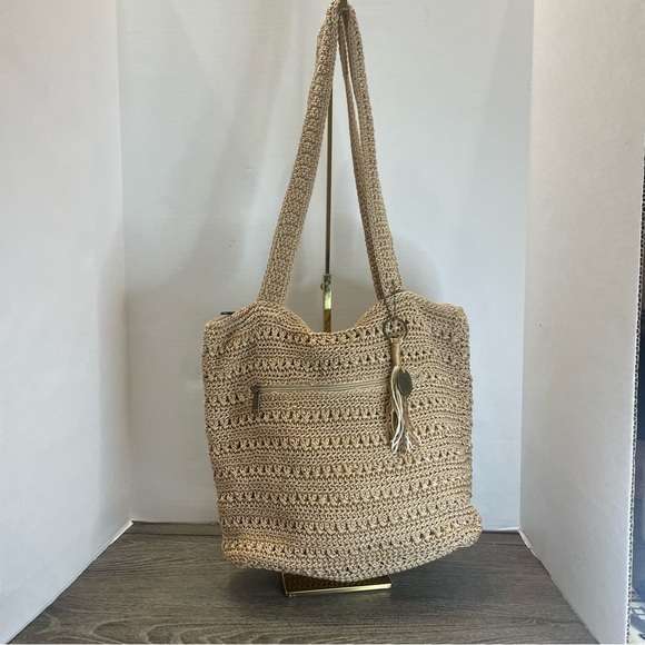 The Sak Handbags - The Sak Shoulder Bag with Textured Woven Pattern. Double strap. Used. Ink spots.